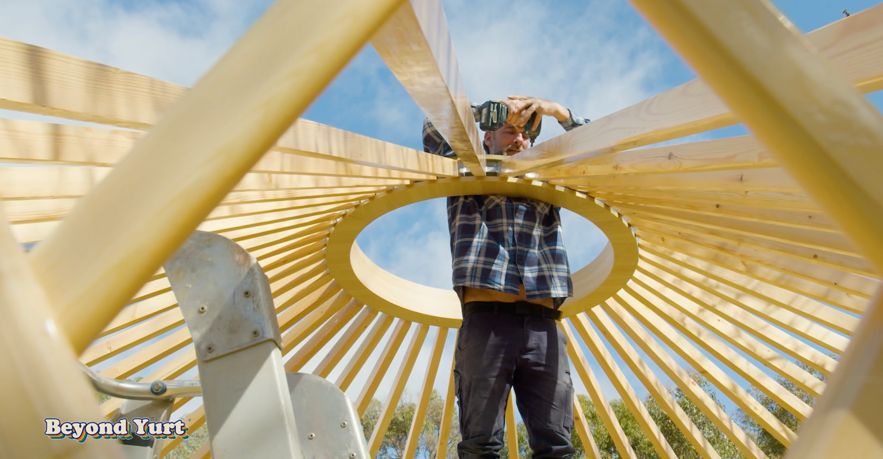 Yurt rafters being installed
