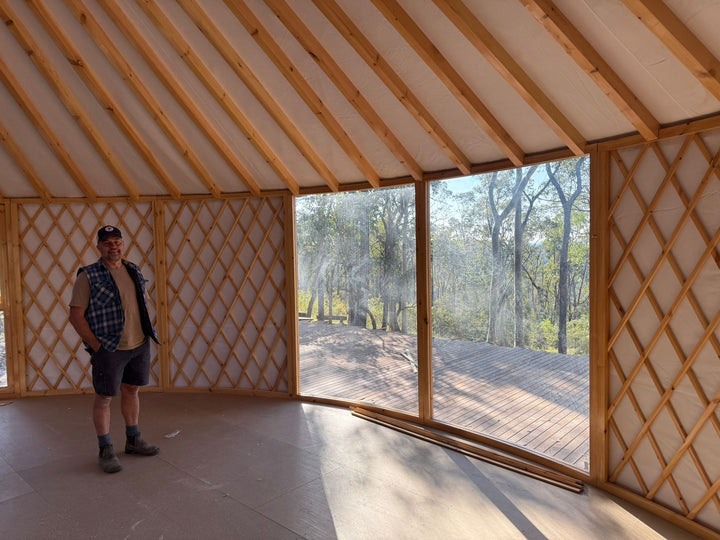 Yurt with large curved windows to frame the view