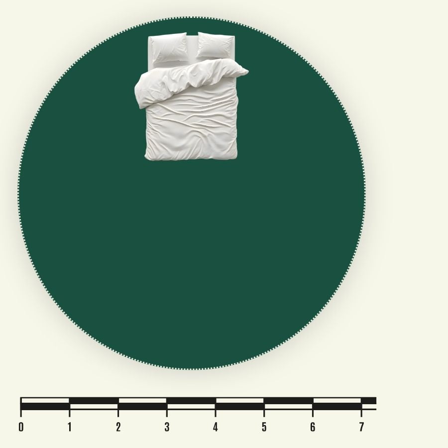 7m yurt scale diagram showing the circular floor area compared with a king-size bed.
